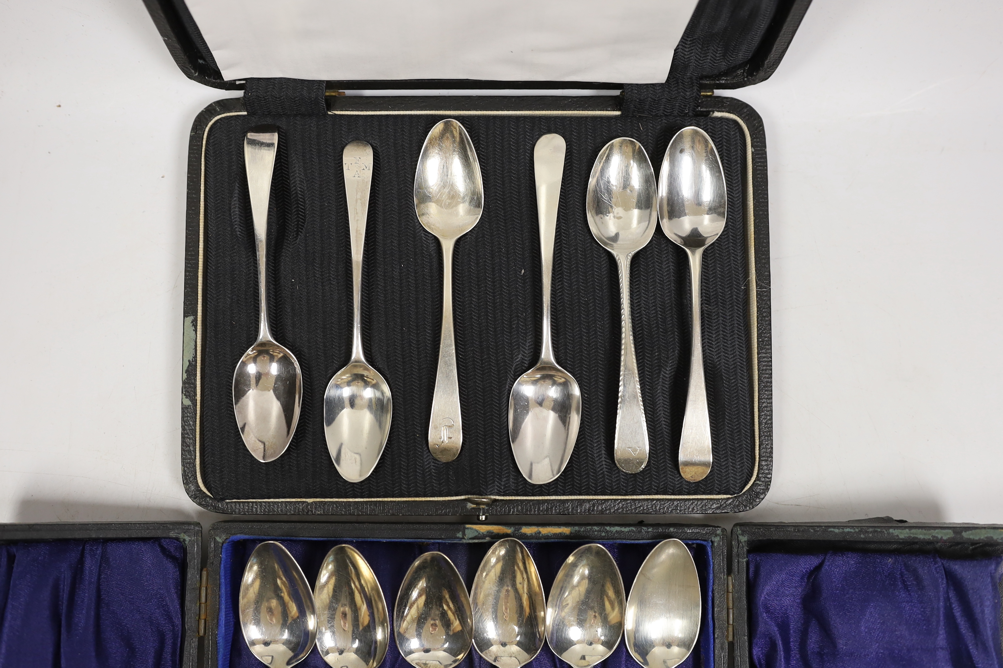Six George III silver teaspoons by Hester Bateman, all different except one pair, London, 1787, together with a cased set of six George III silver Old English pattern teaspoons by Peter & William Bateman, London, 1813.